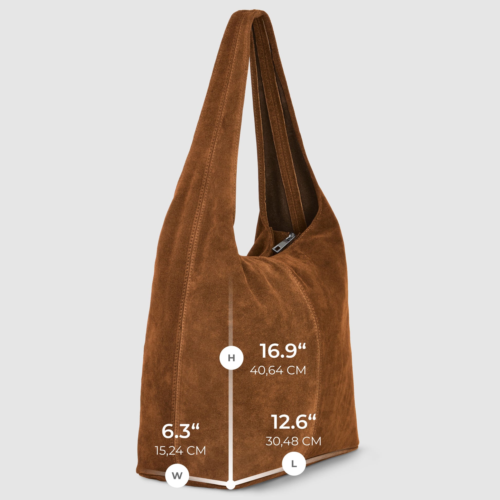 Brown slouchy suede shoulder purse with visible stitching, photographed at an angle. Dimensions are labeled: height 16.9 (40.64 cm), width 6.3 (15.24 cm), and length 12.6 (30.48 cm).