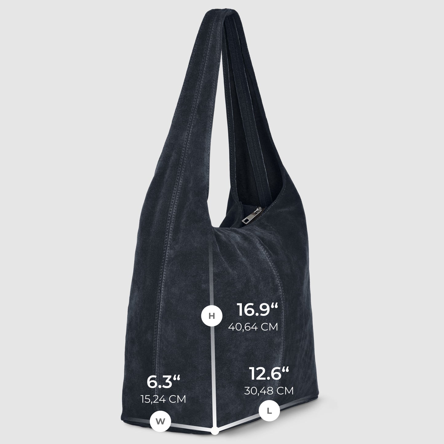 A slouchy suede shoulder purse in dark blue with dimensions: height 16.9 (40.64 cm), width 6.3 (15.24 cm), and length 12.6 (30.48 cm), set against a light gray background.