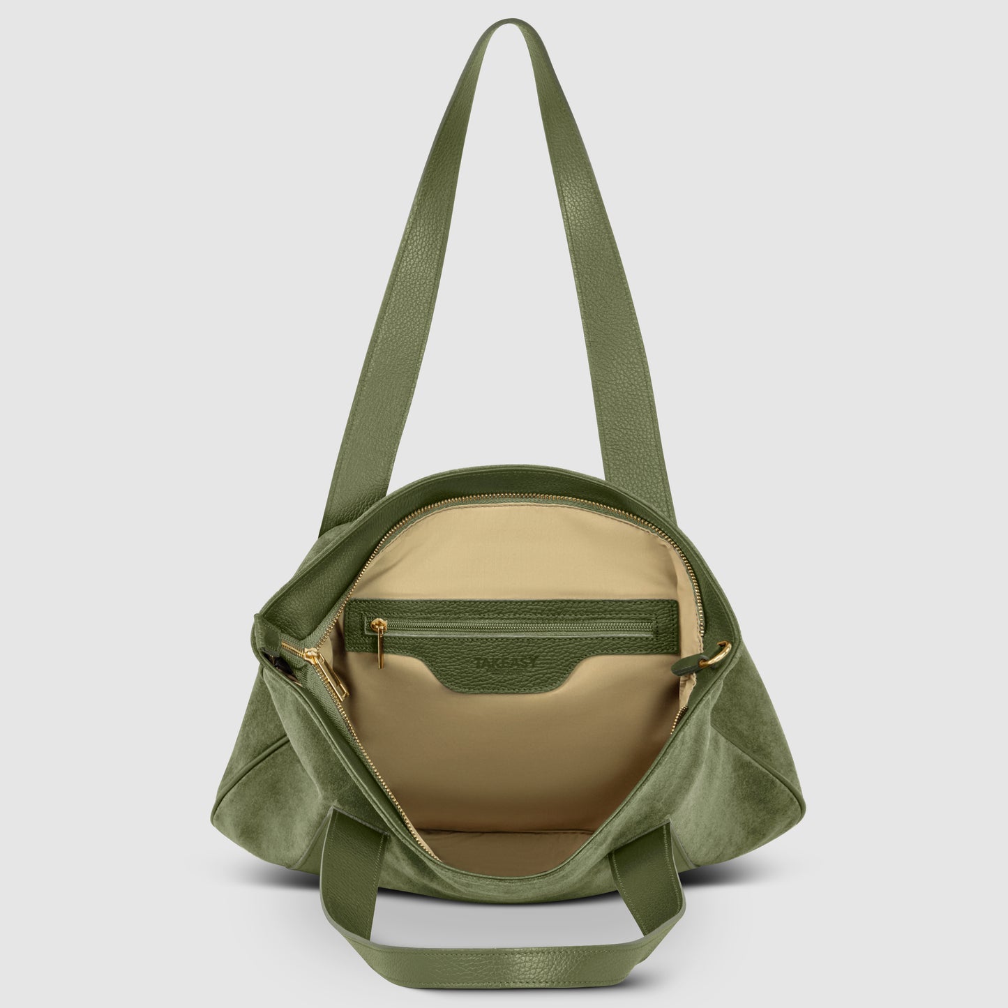 A green Florentine leather bag with an open top, beige interior lining, zippered inner pocket, and gold-tone zipper accents. This Italian style handbag features two shoulder straps and a structured, wide base.