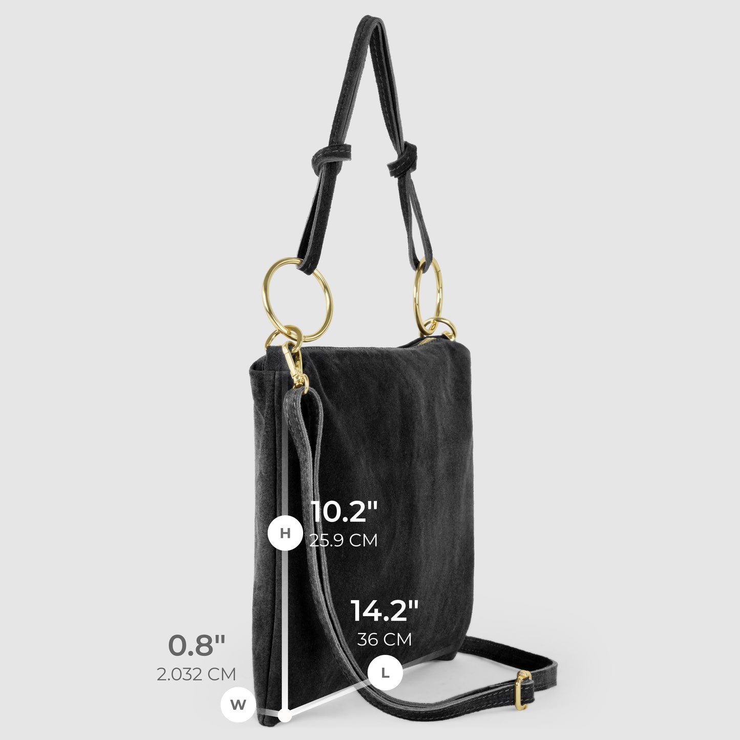 A black slim medium purse with gold rings on the straps is shown against a light gray background. The bag’s dimensions are 10.2 high, 14.2 long, and 0.8 wide (25.9 x 36 x 2 cm).