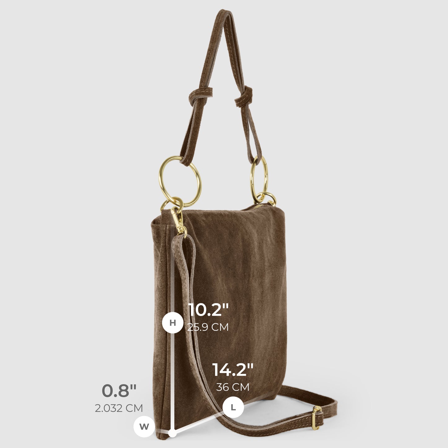 A brown suede leather purse with gold metal rings, zip closure, adjustable strap, and labeled dimensions: height 10.2" (25.9 cm), length 14.2" (36 cm), width 0.8" (2.032 cm), displayed on a plain background.