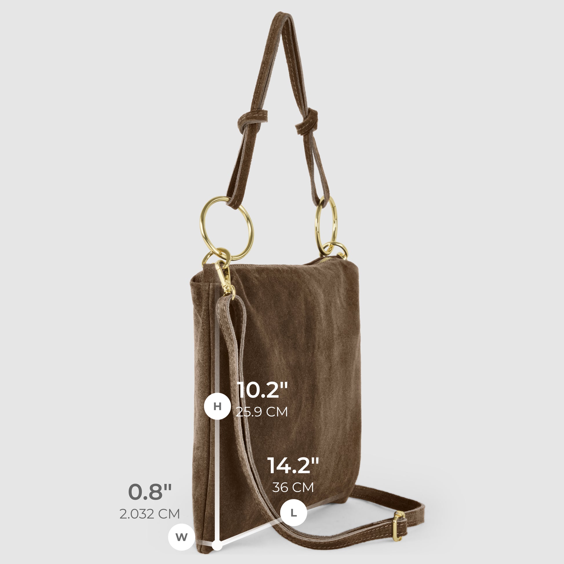 A brown suede leather purse with gold metal rings, zip closure, adjustable strap, and labeled dimensions: height 10.2" (25.9 cm), length 14.2" (36 cm), width 0.8" (2.032 cm), displayed on a plain background.