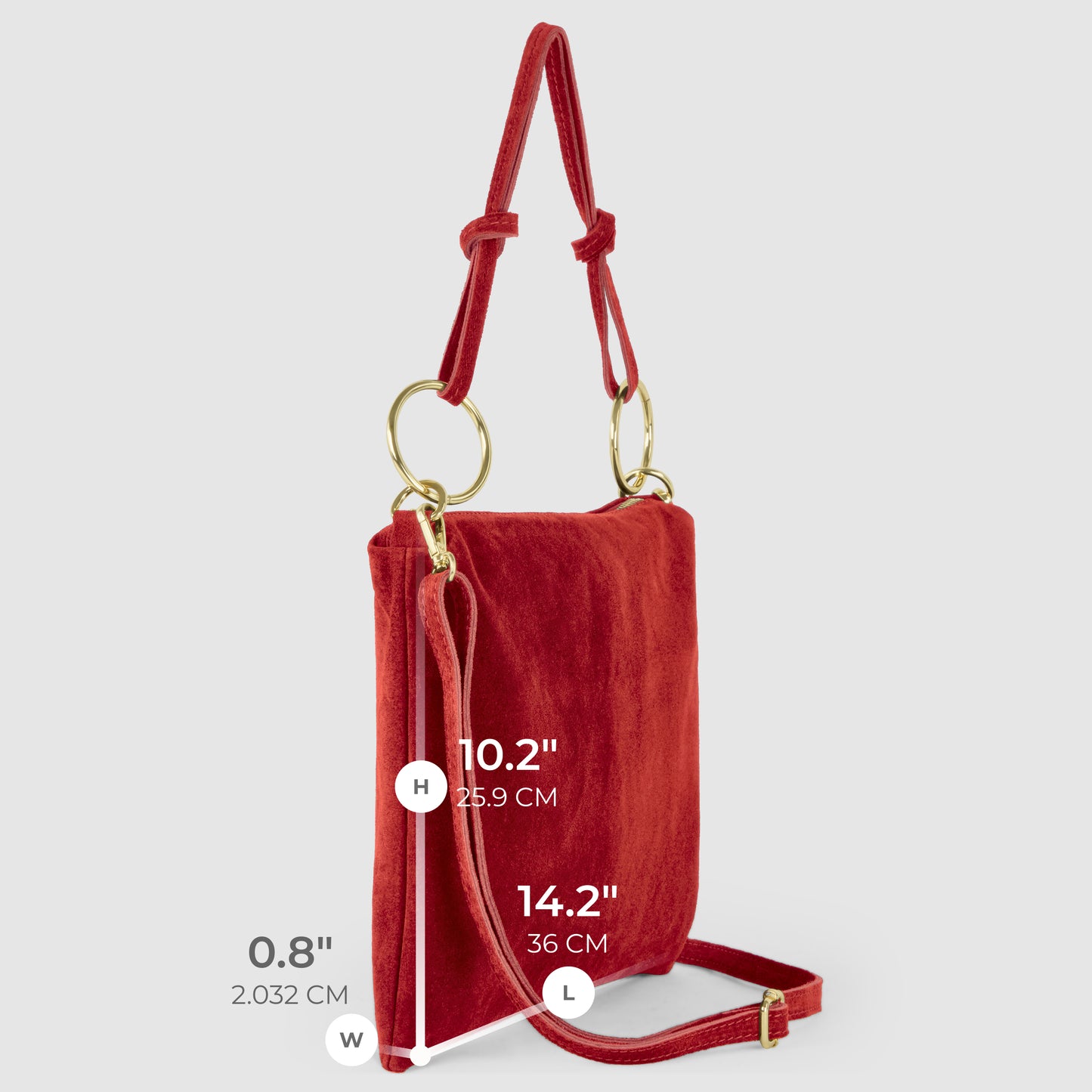 Red velvet Italian suede purse with gold hardware, adjustable and detachable strap, and rings. Dimensions: height 10.2 (25.9 cm), length 14.2 (36 cm), width 0.8 (2.03 cm). Displayed on a light gray background.