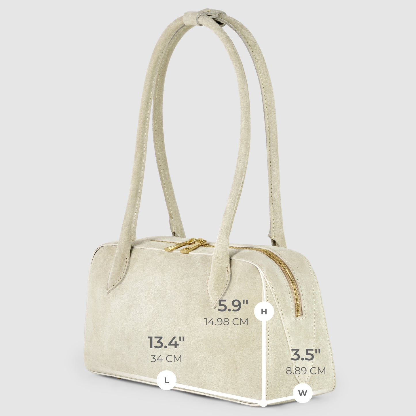 A light beige Italian suede leather bag with two long handles, a gold zipper, and visible dimensions: height 5.9" (14.98 cm), length 13.4" (34 cm), and width 3.5" (8.89 cm), displayed on a light gray background.