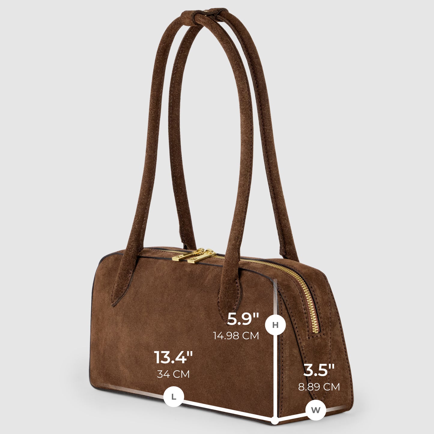 Brown suede handbag with two long handles, gold zipper, and labeled dimensions: length 13.4 (34 cm), height 5.9 (14.98 cm), width 3.5 (8.89 cm), this Florentine leather handbag stands out against a light gray background.