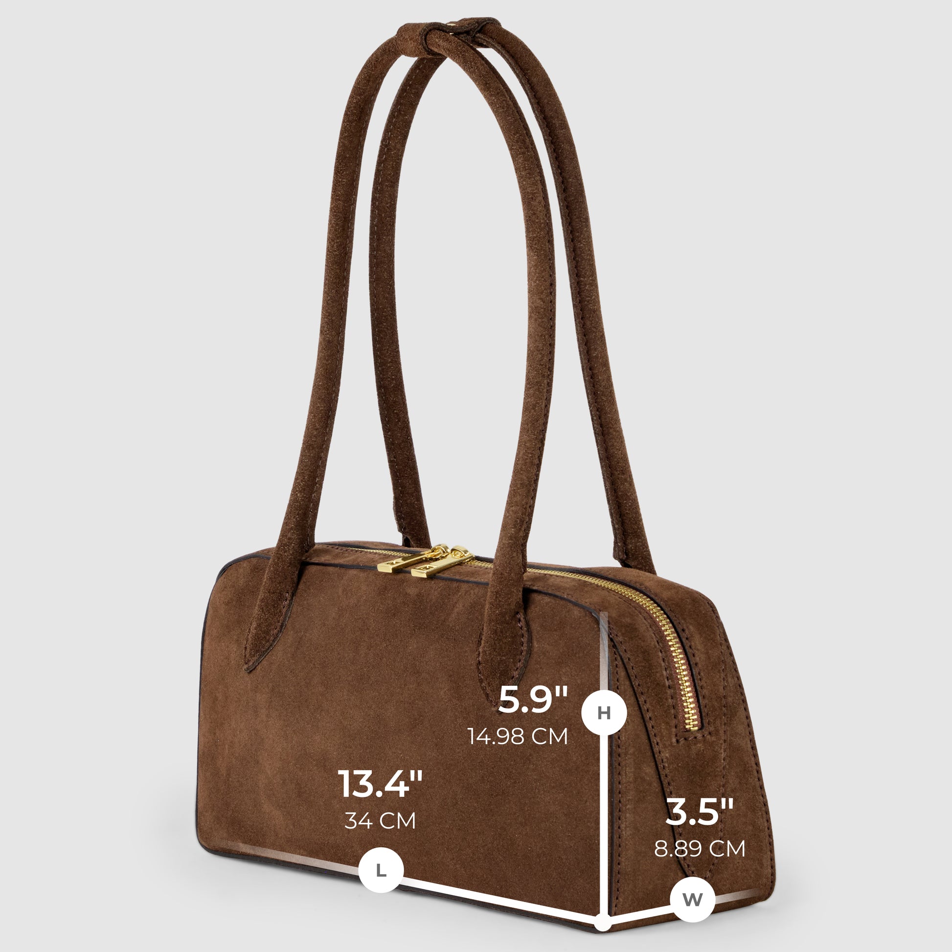 Brown suede handbag with two long handles, gold zipper, and labeled dimensions: length 13.4 (34 cm), height 5.9 (14.98 cm), width 3.5 (8.89 cm), this Florentine leather handbag stands out against a light gray background.