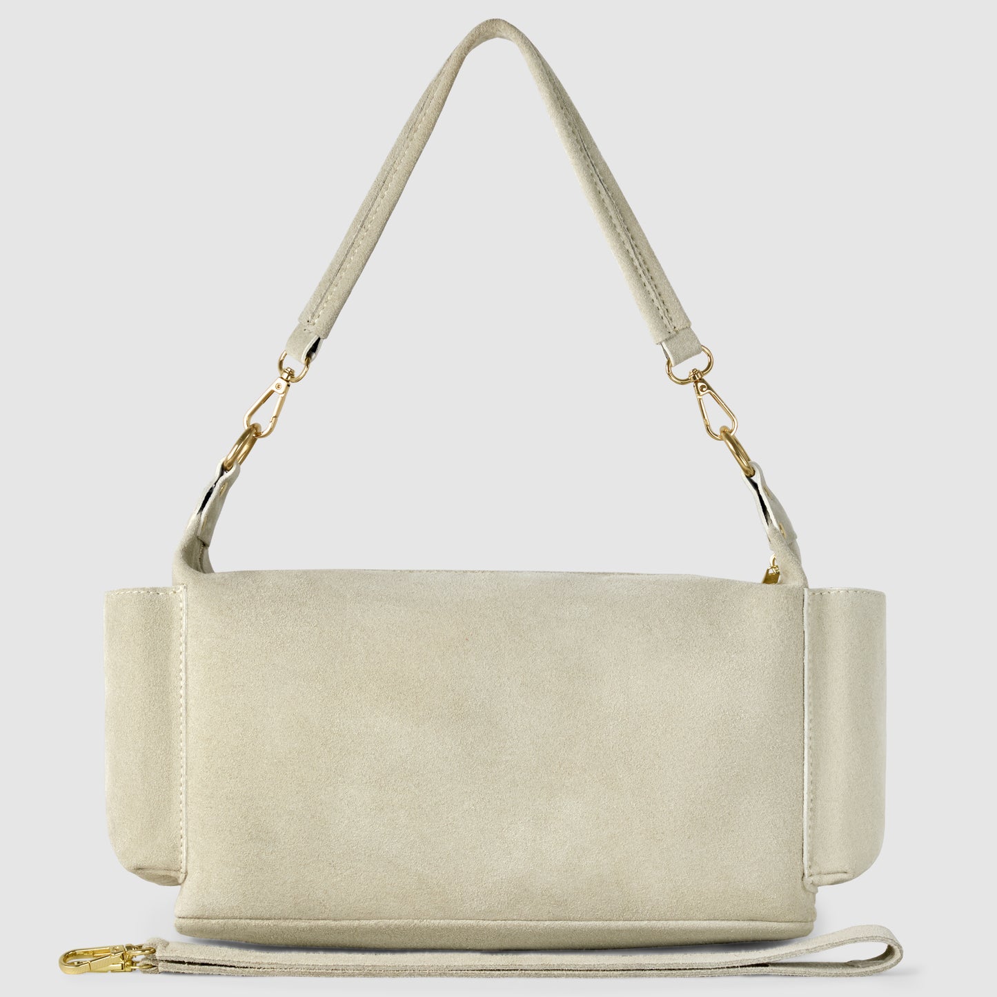 A beige genuine suede leather shoulder bag with gold hardware, a detachable strap, and a simple, rectangular design. This handmade Italian handbag is shown against a plain light background.