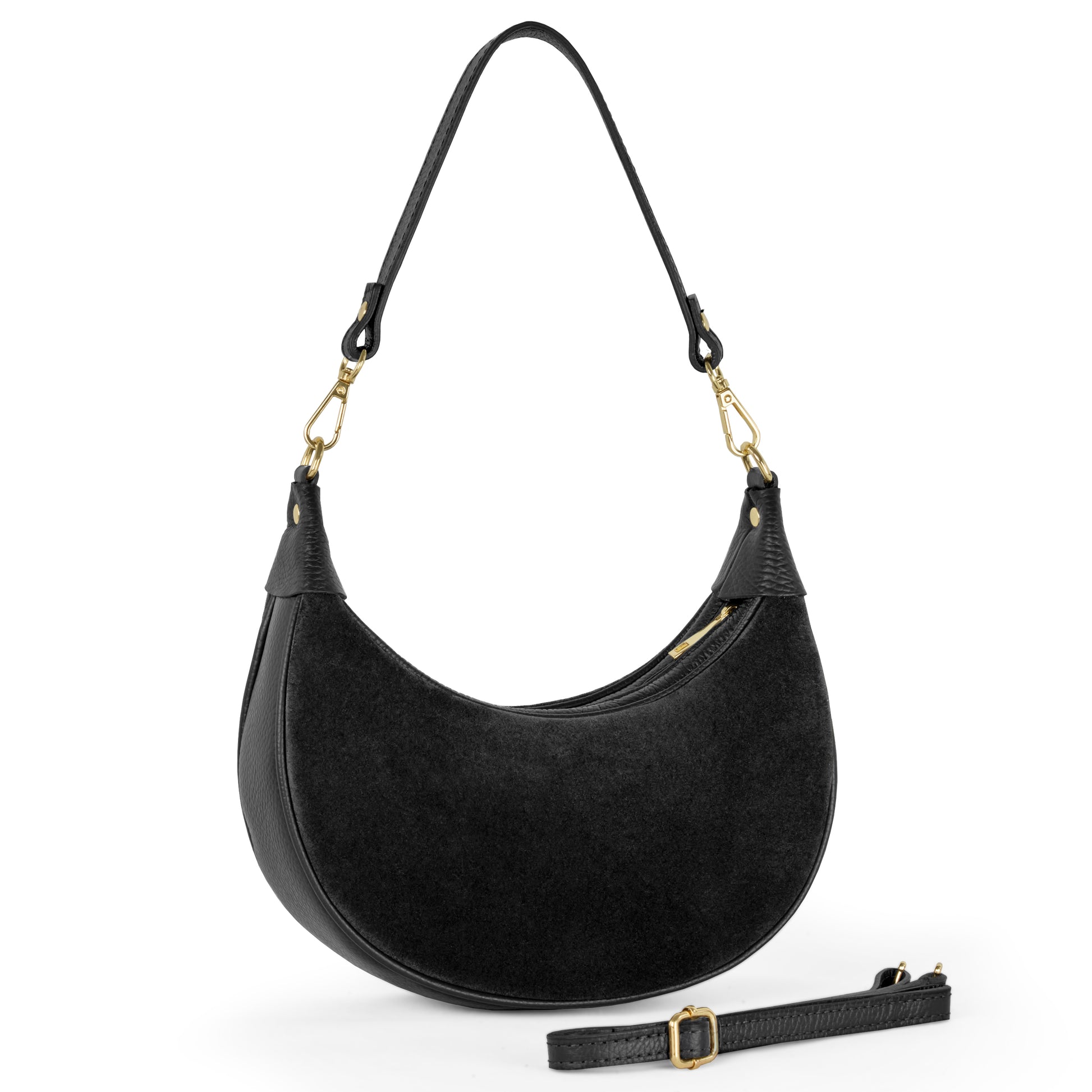 A compact crescent handbag in black suede with a short handle attached by gold clasps, a visible zipper closure, and a detachable, adjustable shoulder strap is crafted for versatility and style.