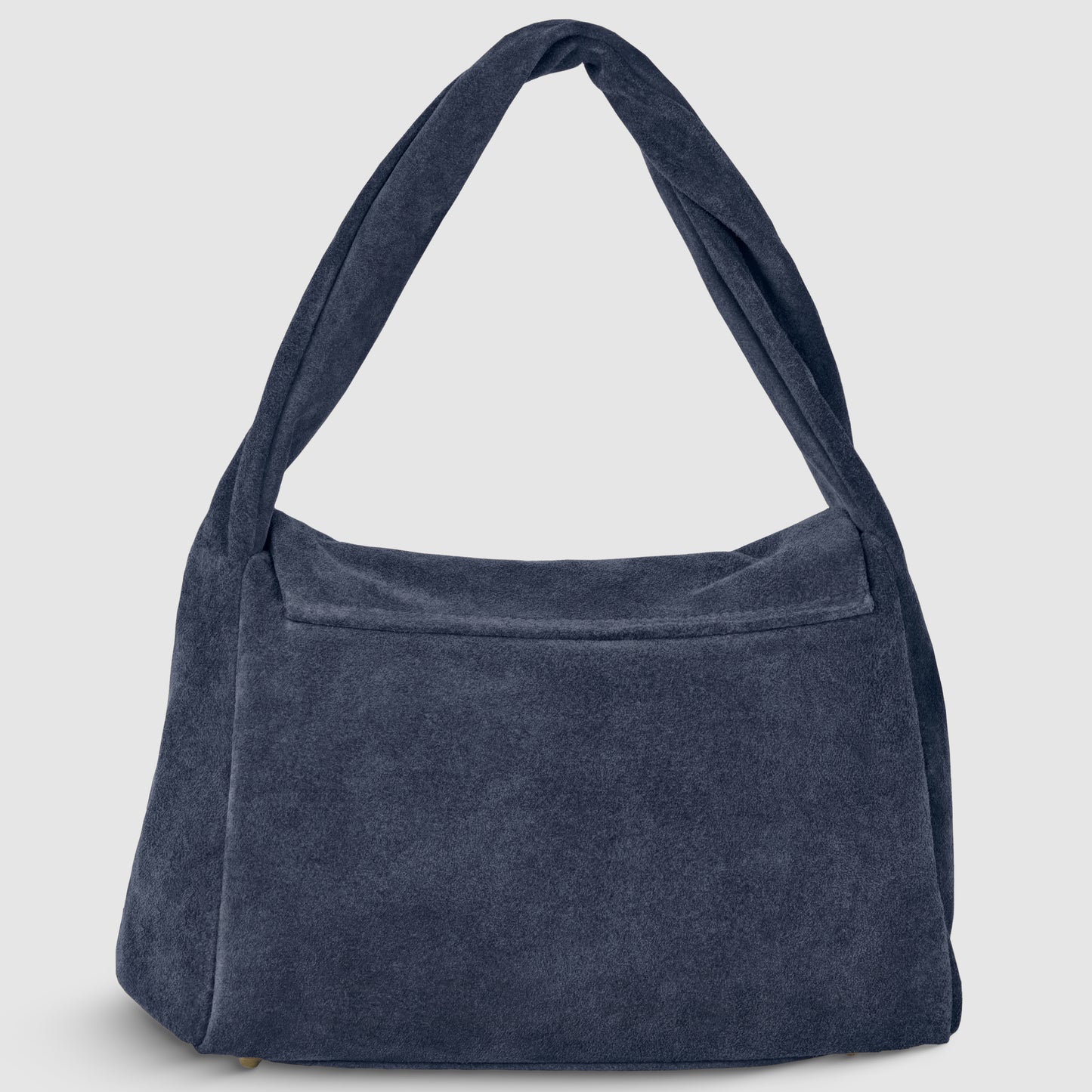 A large, dark blue Italian suede bag with a wide strap, rectangular shape, and minimalist design, handmade in Italy and set against a plain light gray background.