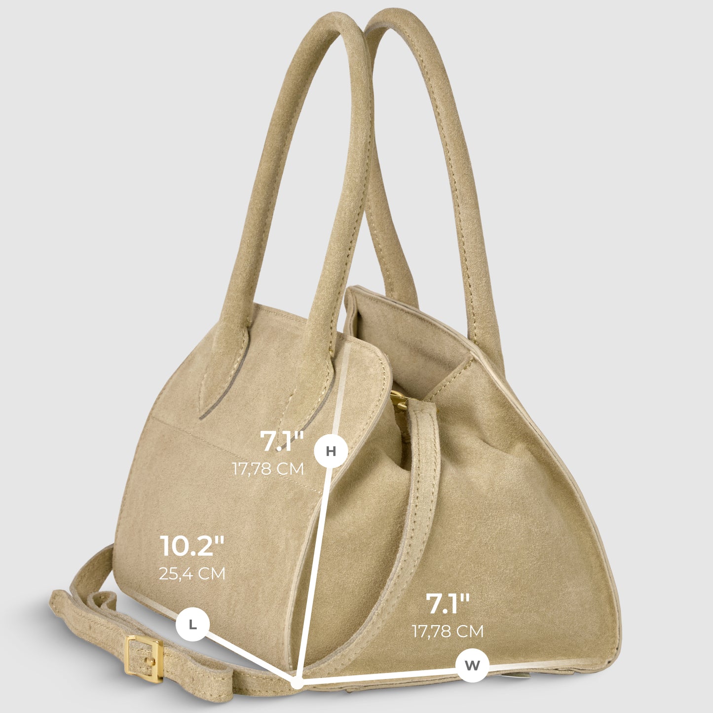A handmade Italian handbag in beige genuine suede, featuring two handles and a shoulder strap, is displayed against a light background. Dimensions are labeled: height 7.1 (17.78 cm), length 10.2 (25.4 cm), width 7.1 (17.78 cm).