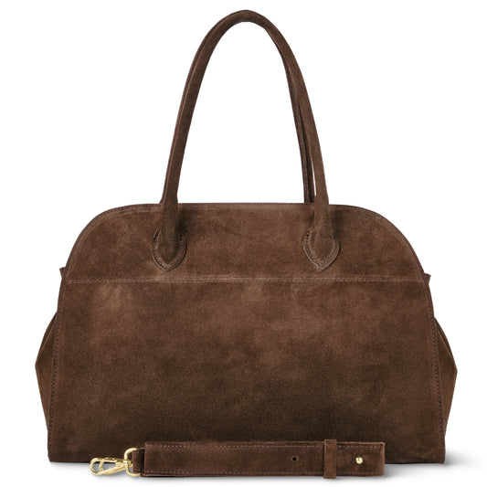 A brown Italian suede handbag with two handles and a removable shoulder strap, featuring a simple, structured doctor's bag purse design and gold hardware on the strap clasp.