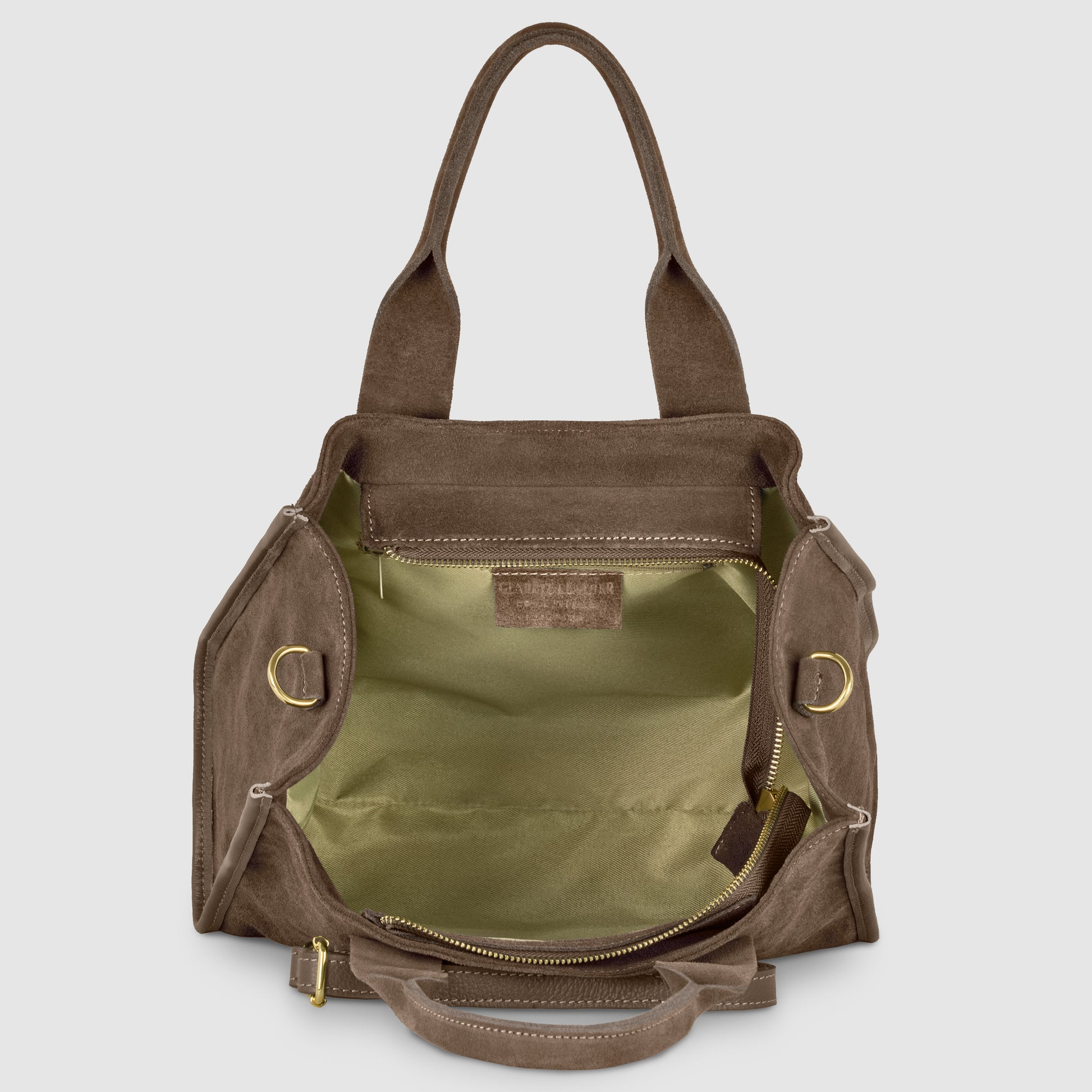An open brown canvas tote bag with a structured shape, gold-tone hardware, beige fabric lining, and two handles. Showcasing Italian craftsmanship, the bag is empty, displaying its spacious interior and internal leather label.