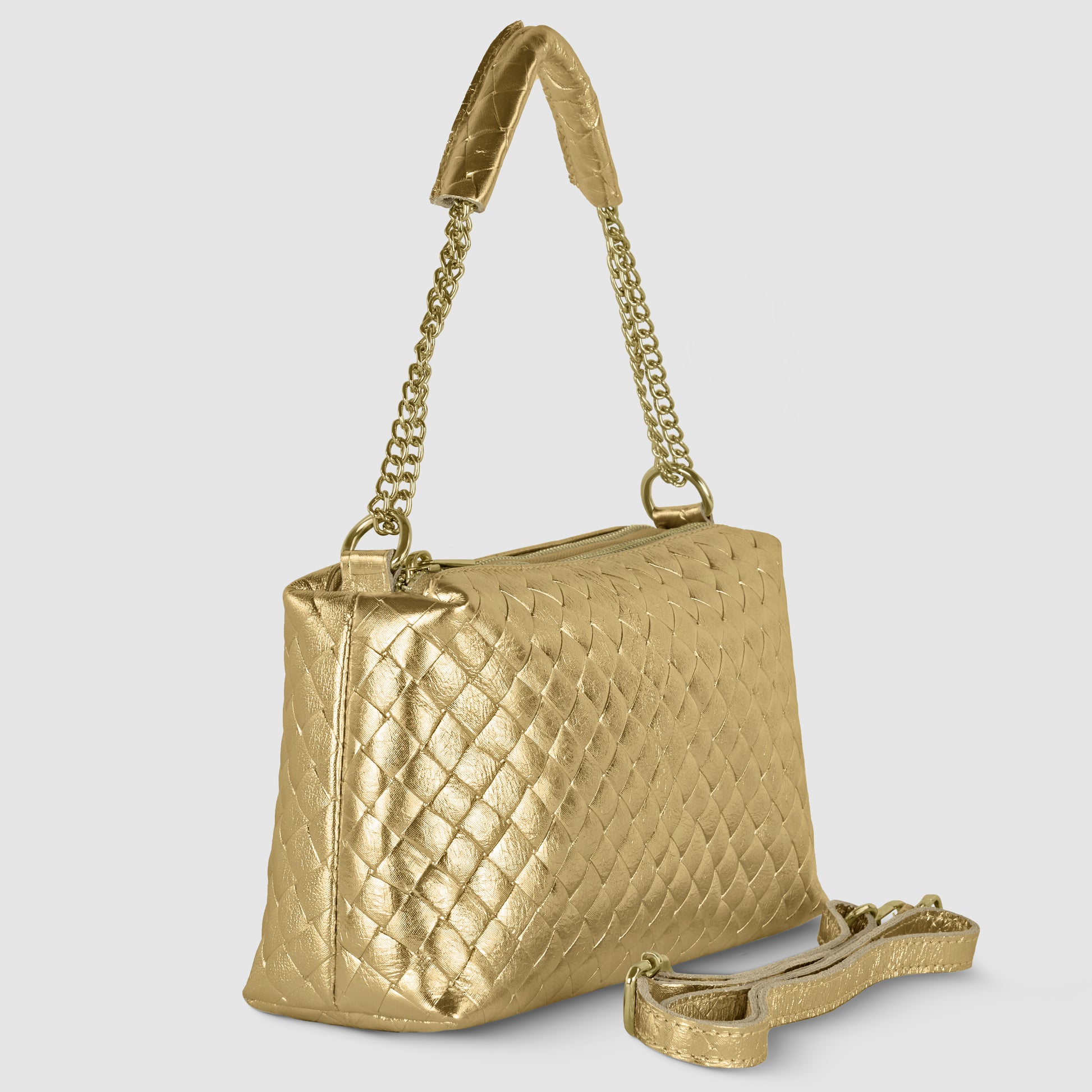 A gold quilted miniature handbag with a chain strap and an additional matching shoulder strap, showcasing exquisite Italian craftsmanship, is placed beside it against a plain light background.