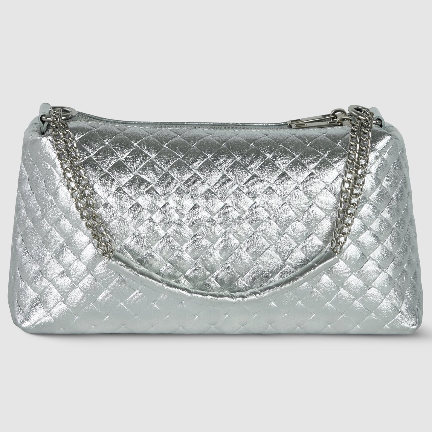 A metallic silver quilted miniature handbag with a diamond pattern, crafted with Italian craftsmanship, featuring a silver chain strap and a zipper closure on top, displayed against a plain light background.