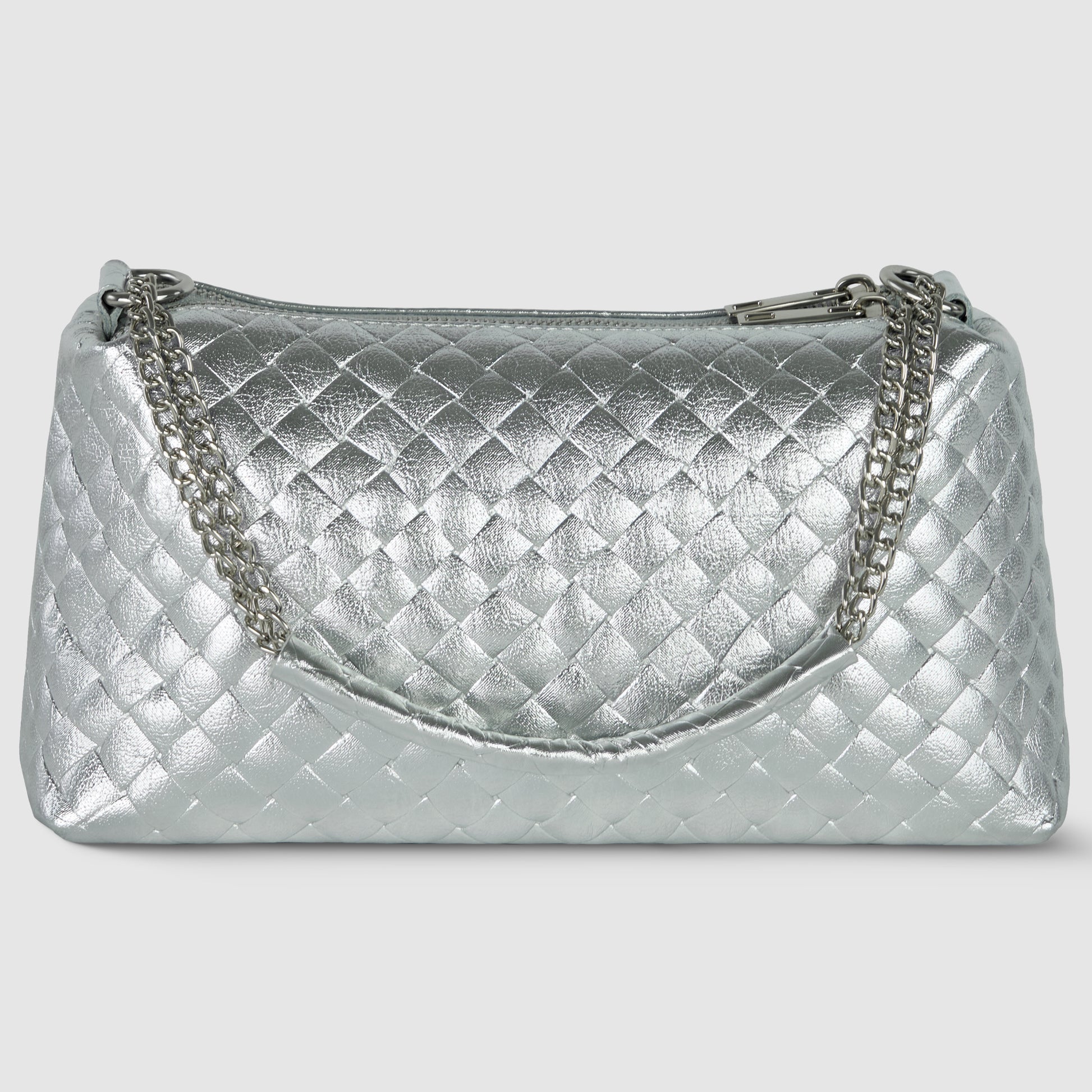 A metallic silver quilted miniature handbag with a diamond pattern, crafted with Italian craftsmanship, featuring a silver chain strap and a zipper closure on top, displayed against a plain light background.