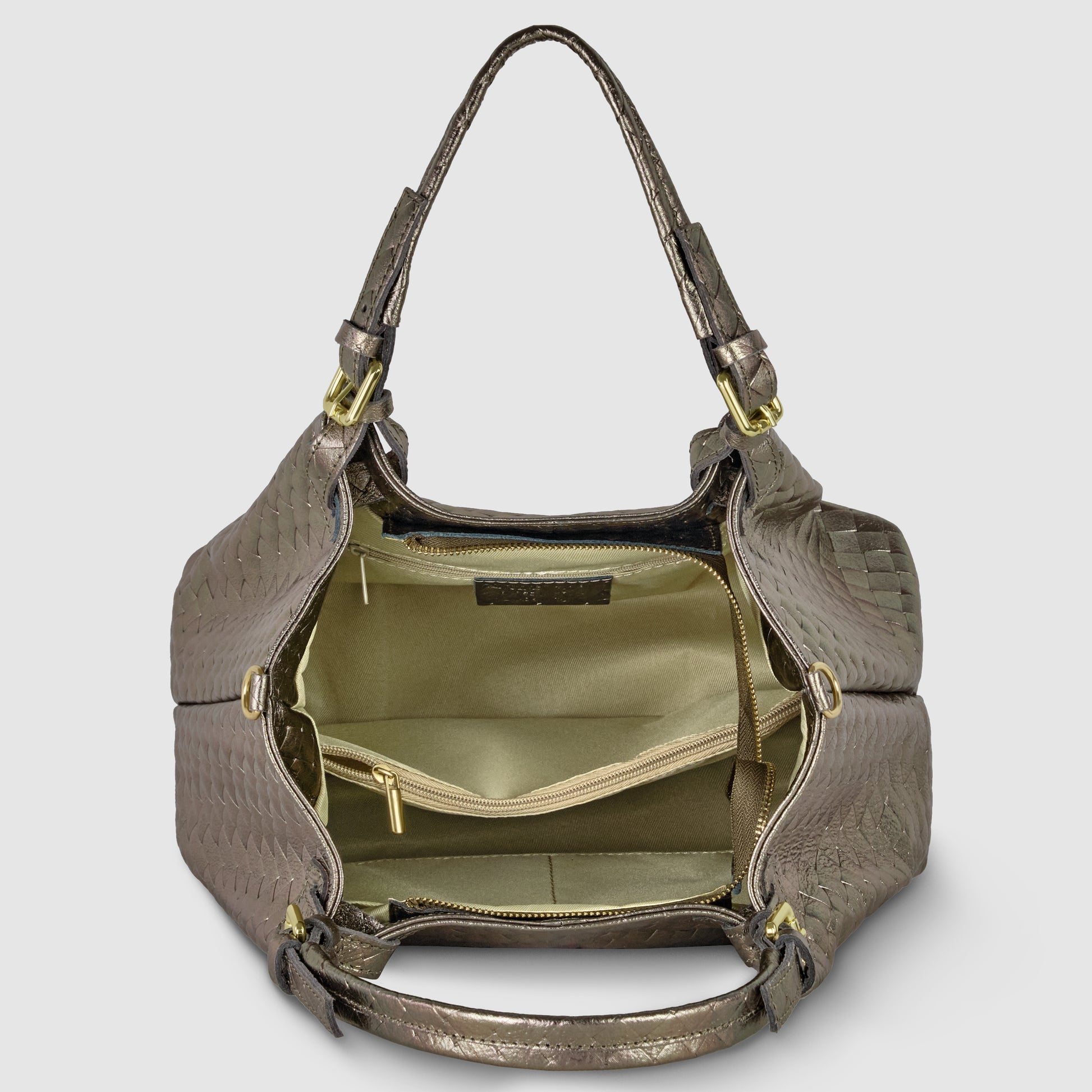 Open brown Florentine leather handbag with gold hardware, revealing a spacious beige fabric interior featuring pockets and a zippered compartment. The bag has two handles and elegant side detailing.
