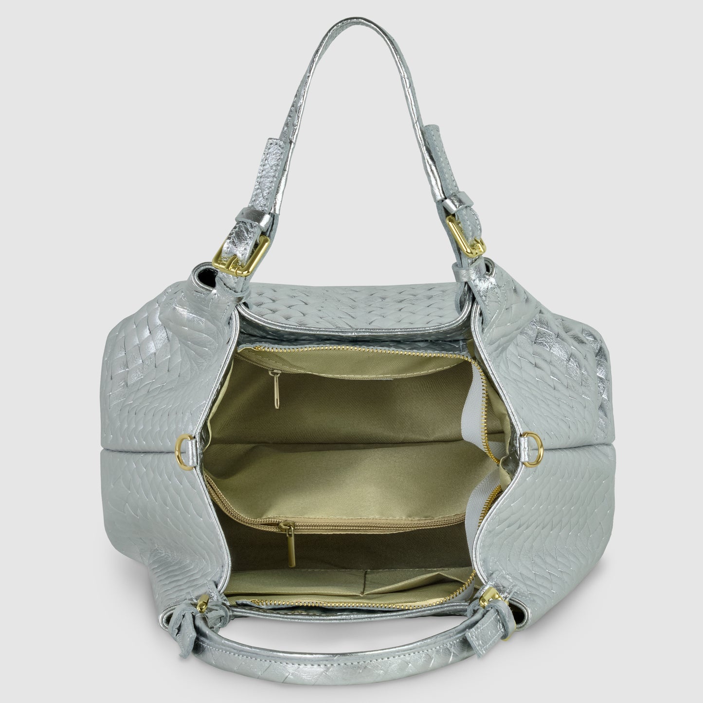 A silver woven Italian-made handbag with gold hardware is shown open, revealing a tan fabric interior with multiple compartments and zippered pockets.