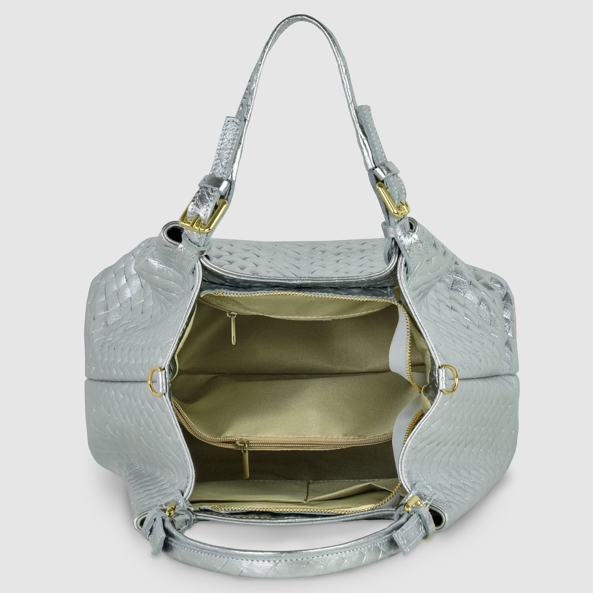A silver woven Italian-made handbag with gold hardware is shown open, revealing a tan fabric interior with multiple compartments and zippered pockets.