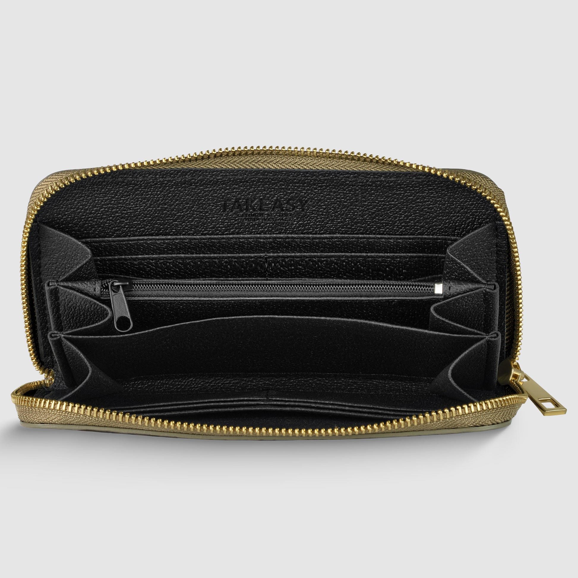 A black Italian leather wallet, handcrafted in Italy, is open to reveal multiple compartments and a zippered pocket inside. The background is a plain light gray.